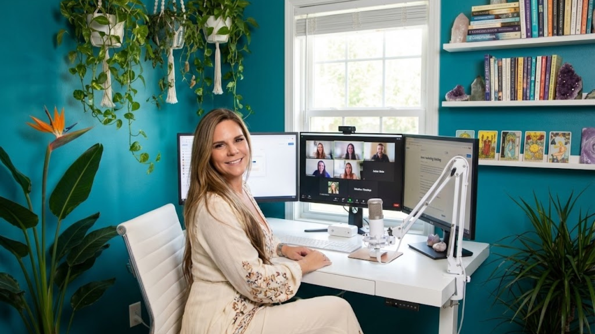 Christina Rae Hosting Momentum Lab Christina Rae of Momentive Media hosting Momentum Lab, a free live somatic business coaching session on Google Meet, from her teal home office studio surrounded by plants, crystals, and books.